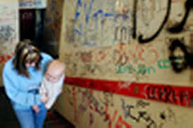 How can schools support children living in difficult conditions